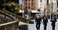 Sydney extends lockdown as other Australian cities reopen