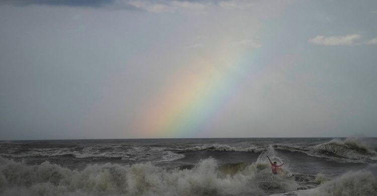 Tropical storm dumps rain on northern Japan, spares Olympics